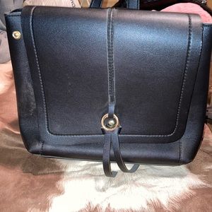 A back pack slash purse from a boutique